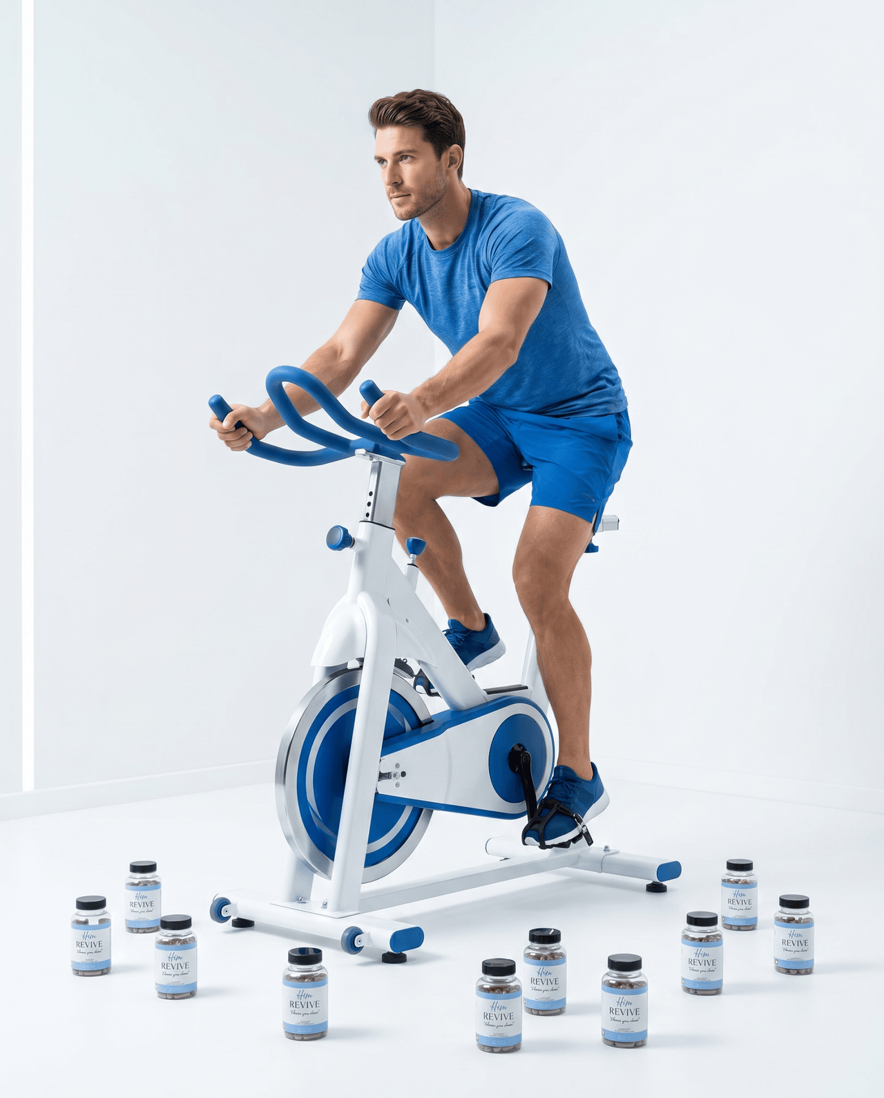 HIM REVIVE - man on exercise bike wellness supplement all on floor supplement for men  VitalityRevival UK